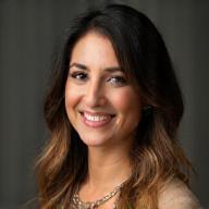 Professional headshot of Nora Abbas, Studio Producer at Sutra Studio.